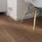 Laminat BoDomo Premium Schlossdiele dunkel Produktbild Wohnzimmer - Urban mit Wohnwand zoom