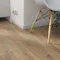 Laminat BoDomo BoDomo Premium Tower Oak braun Produktbild Wohnzimmer - Urban mit Wohnwand zoom